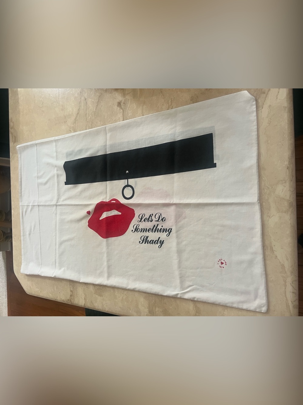 Retro pillowcase features a fun graphic of red lips 👄 "Let's Do Something Shady!